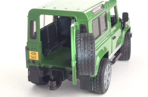 Bruder Внедорожник Land Rover Defender c прицепом-платформой, гусеничным мини экскаватором 8010 CTS и рабоч